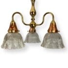 THREE ARM BRASS CHANDELIER WITH HOLOPHANE GLASS SHADES